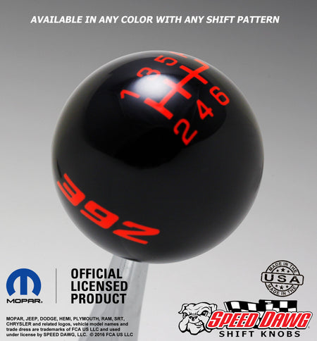 Black shift knob with Go Mango Orange graphics