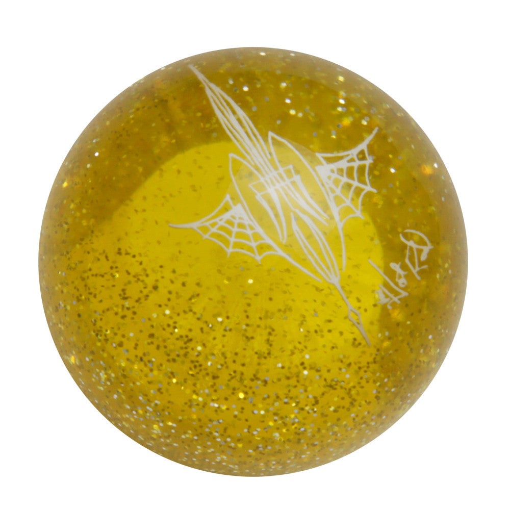 Transparent yellow metal flake shift knob with pinstripe design by Von Hot Rod